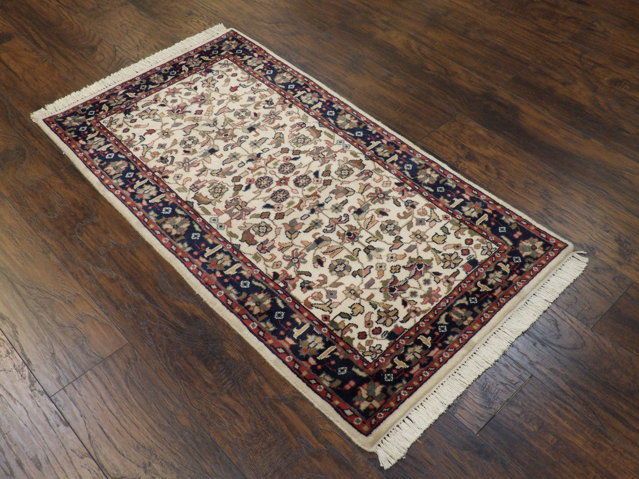 Blue accent Kashan rug in a room setting