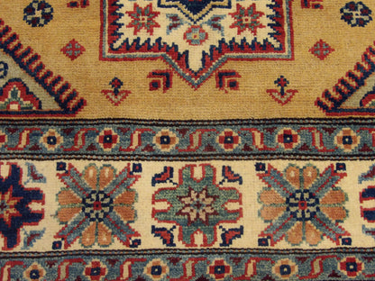 Tribal Kazak rug border detail