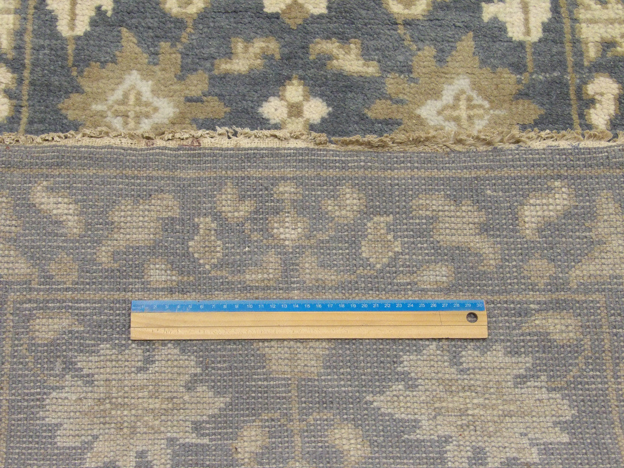 Blue Oushak runner in hallway setting
