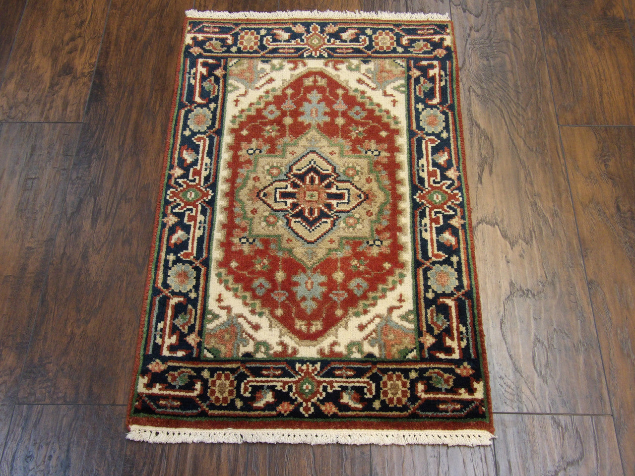 Close-up of wool pile, blue and red rug