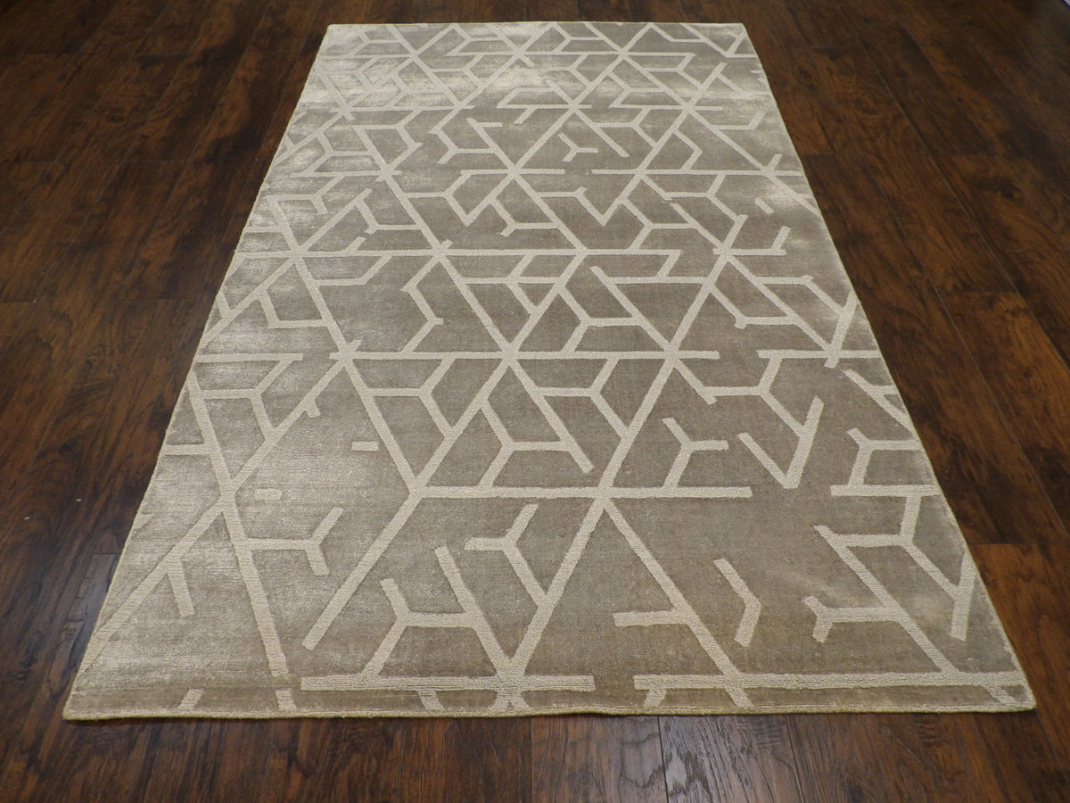 Close-up of silky wool pile, gray rug