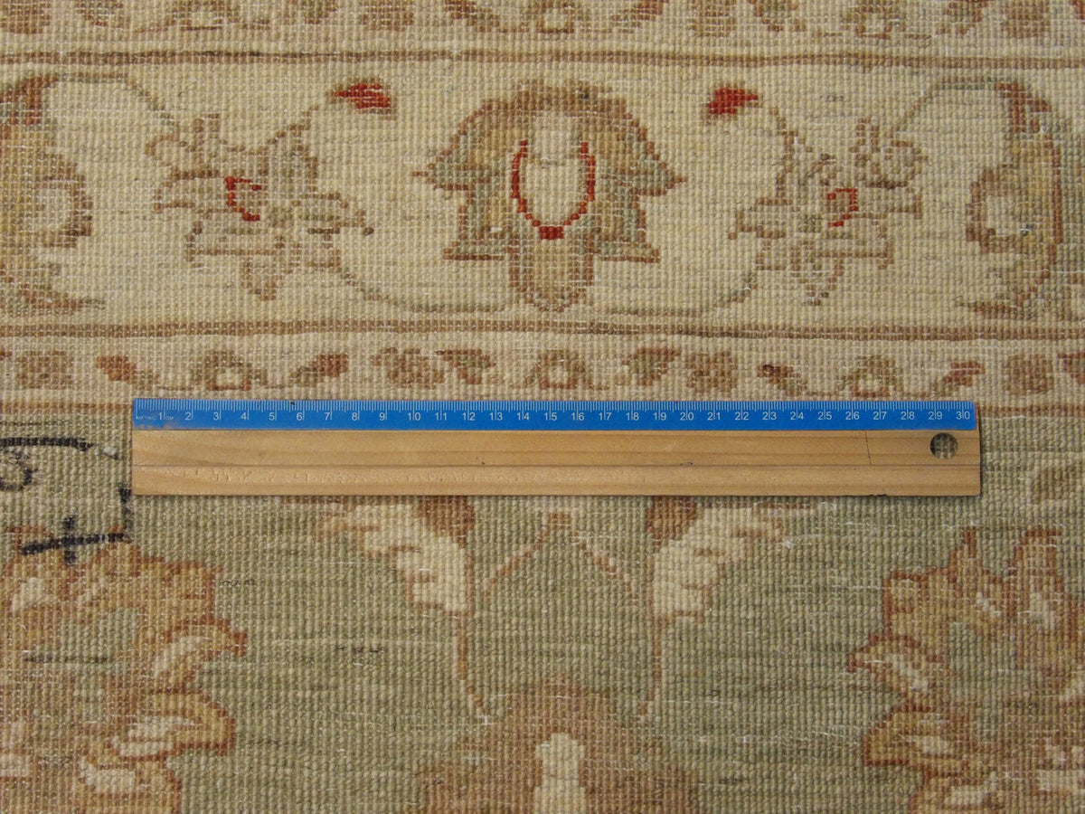 Green & Beige Oushak Chobi Natural Dye rug in room setting
