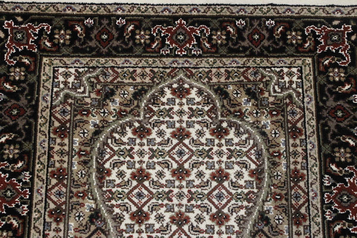Traditional Indo Qum rug border detail