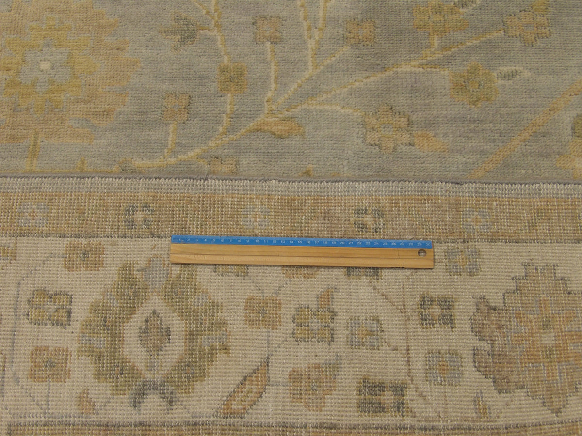 Blue & Beige Turk Anatolian Oushak Wash rug in room setting