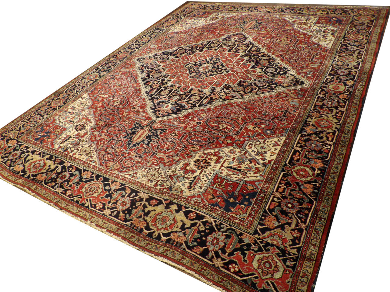 Sherapi medallion pattern detail, antique blue and red rug