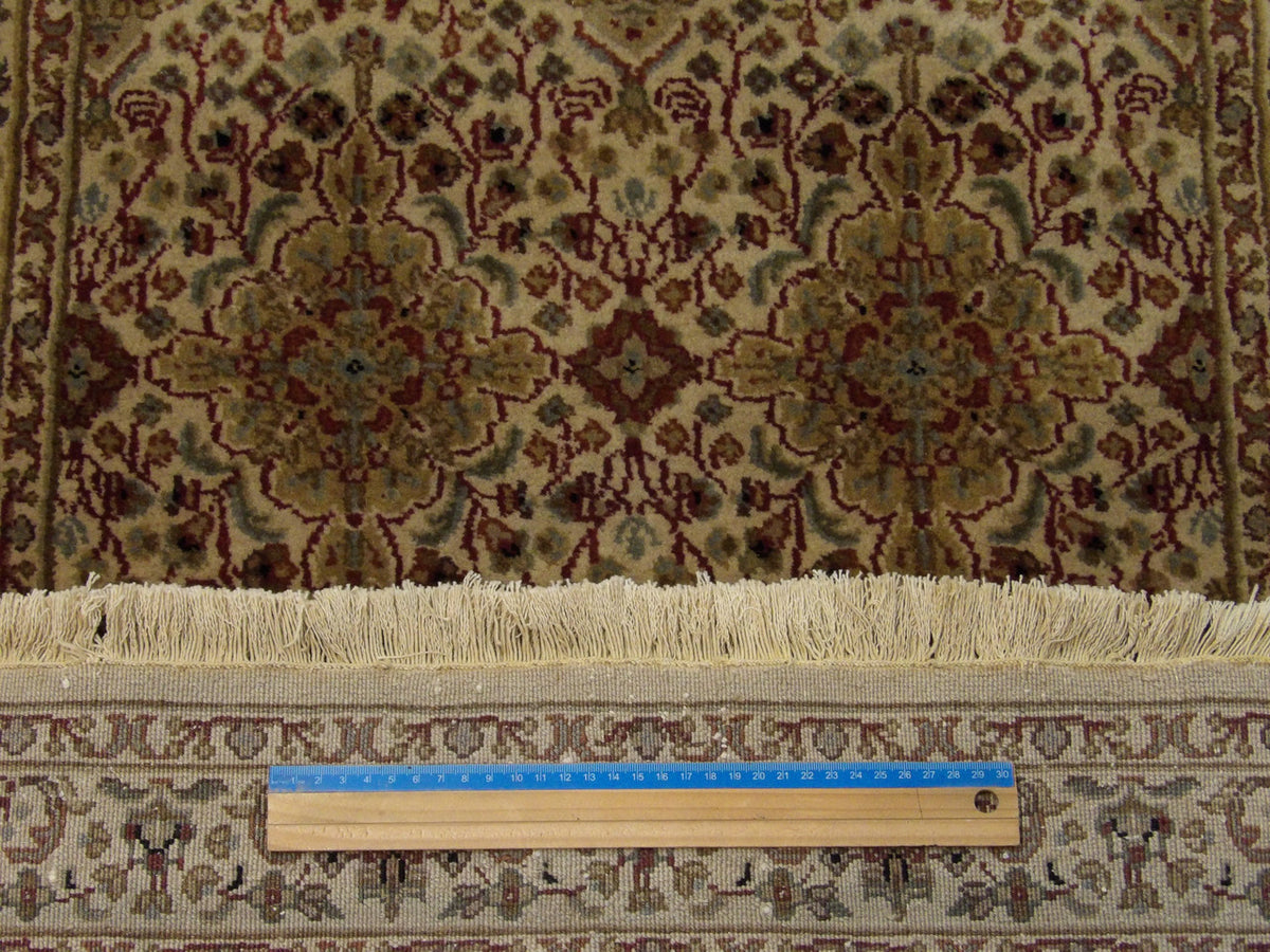 Gold & Beige Fine Persian Kashan rug in room setting