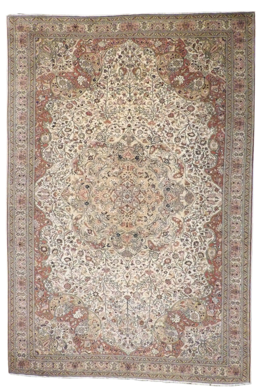 Antique Turkish Hereke hand-knotted wool-silk rug in Beige & Pink, full view