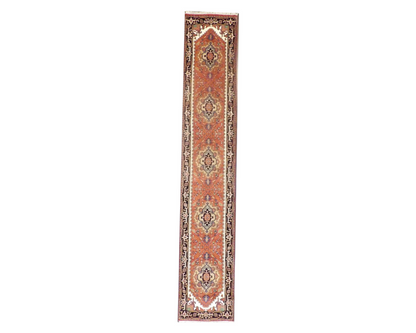 Tribal Heriz hand-knotted wool rug in Blue & Rust, full view