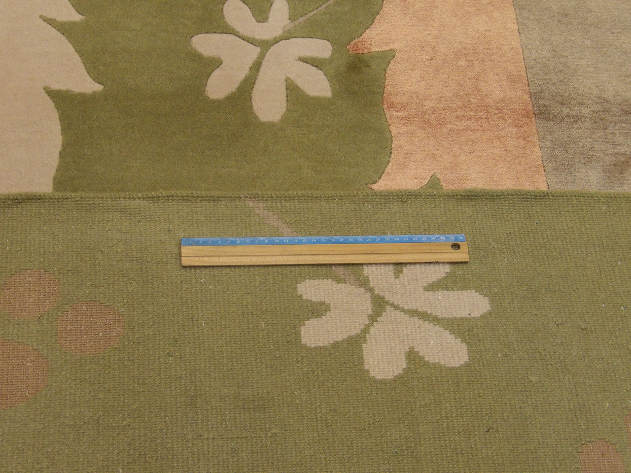 Brown & Green Modern Nepalese Line Leaf Design rug in room setting