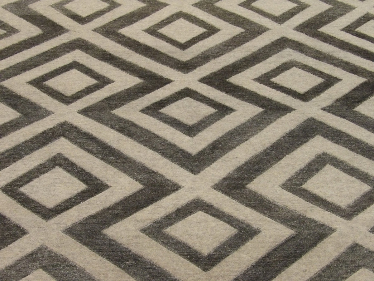 Close-up of wool pile, blue and gray rug