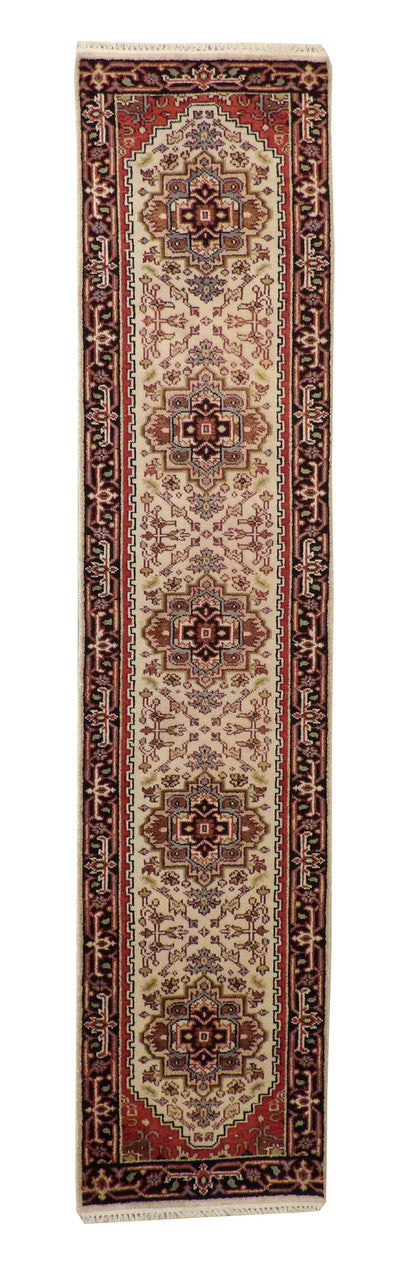 Tribal Heriz hand-knotted wool rug in Beige, full view