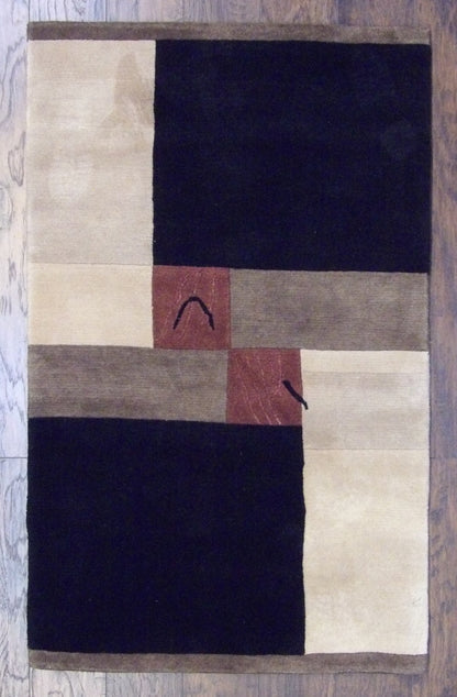 Modern Geometrical Design hand-knotted wool rug in Black & Beige, full view
