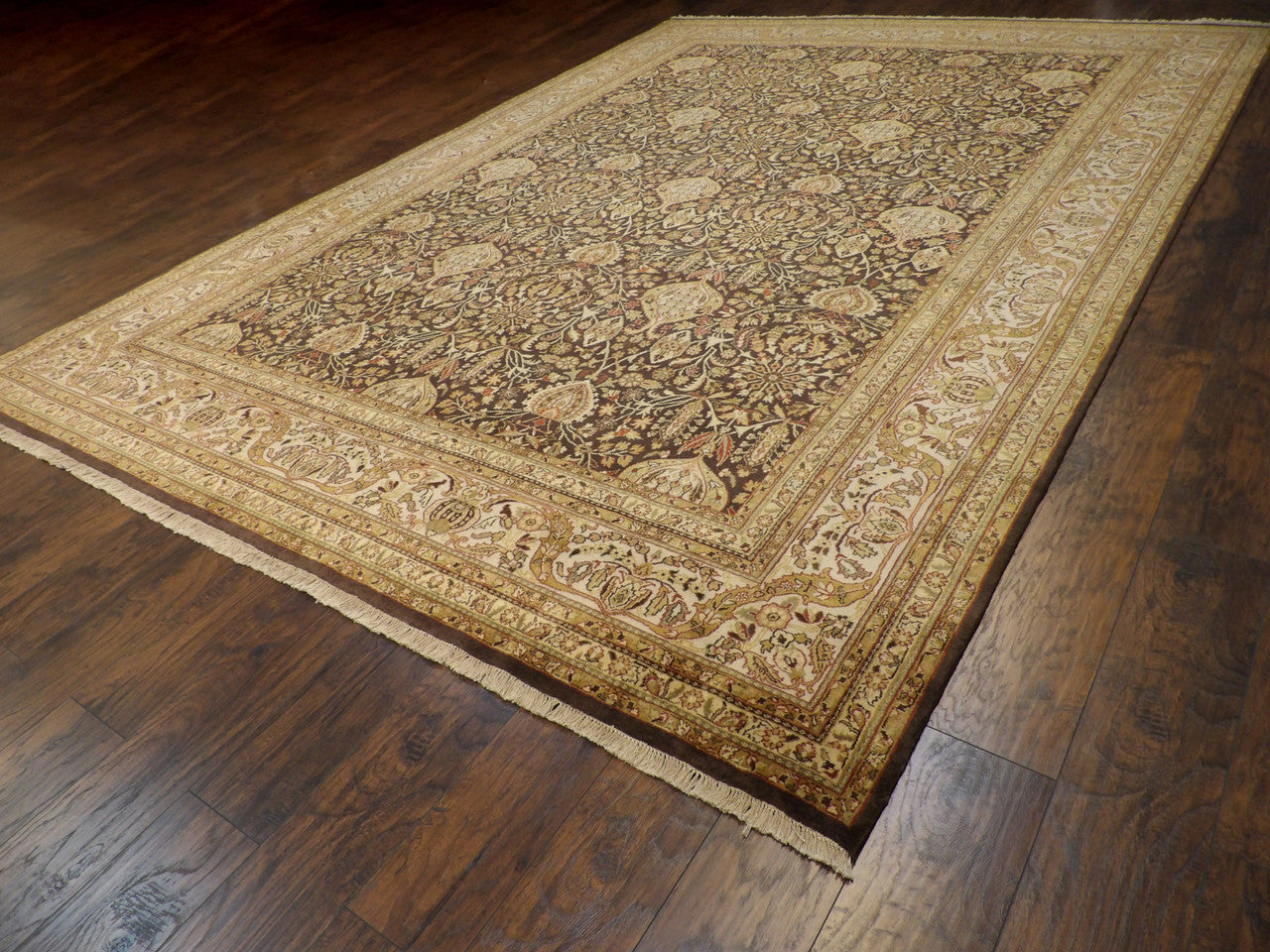 Brown & Beige Fine Persian Haji Jalili rug in room setting