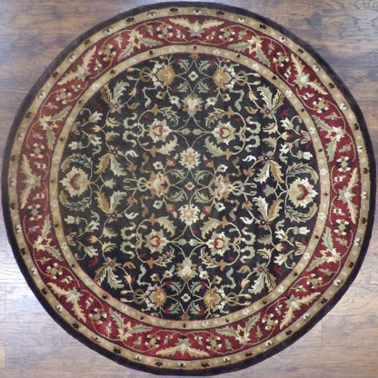 Indo Ziegler hand-knotted wool round rug in black and red, full view