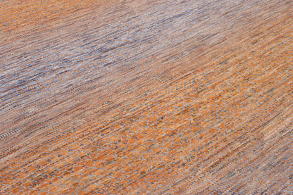 Gray & Rust Modern Grass Design rug in room setting