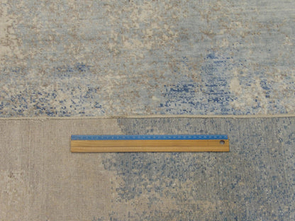 Full room view of transitional oxidized abstract hand-knotted rug