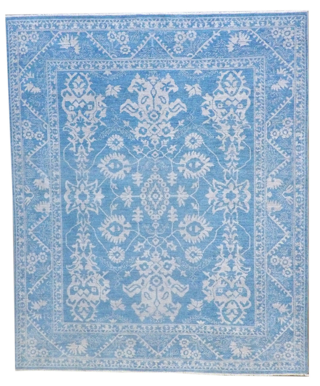 Oushak Chobie natural dye hand-knotted wool rug in blue and gray, full view, 8x10