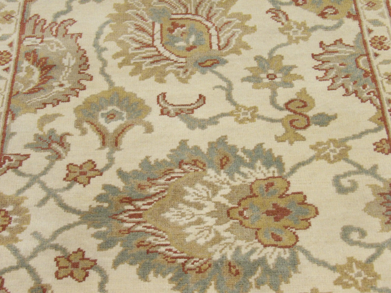 Back of Oushak hand-knotted rug
