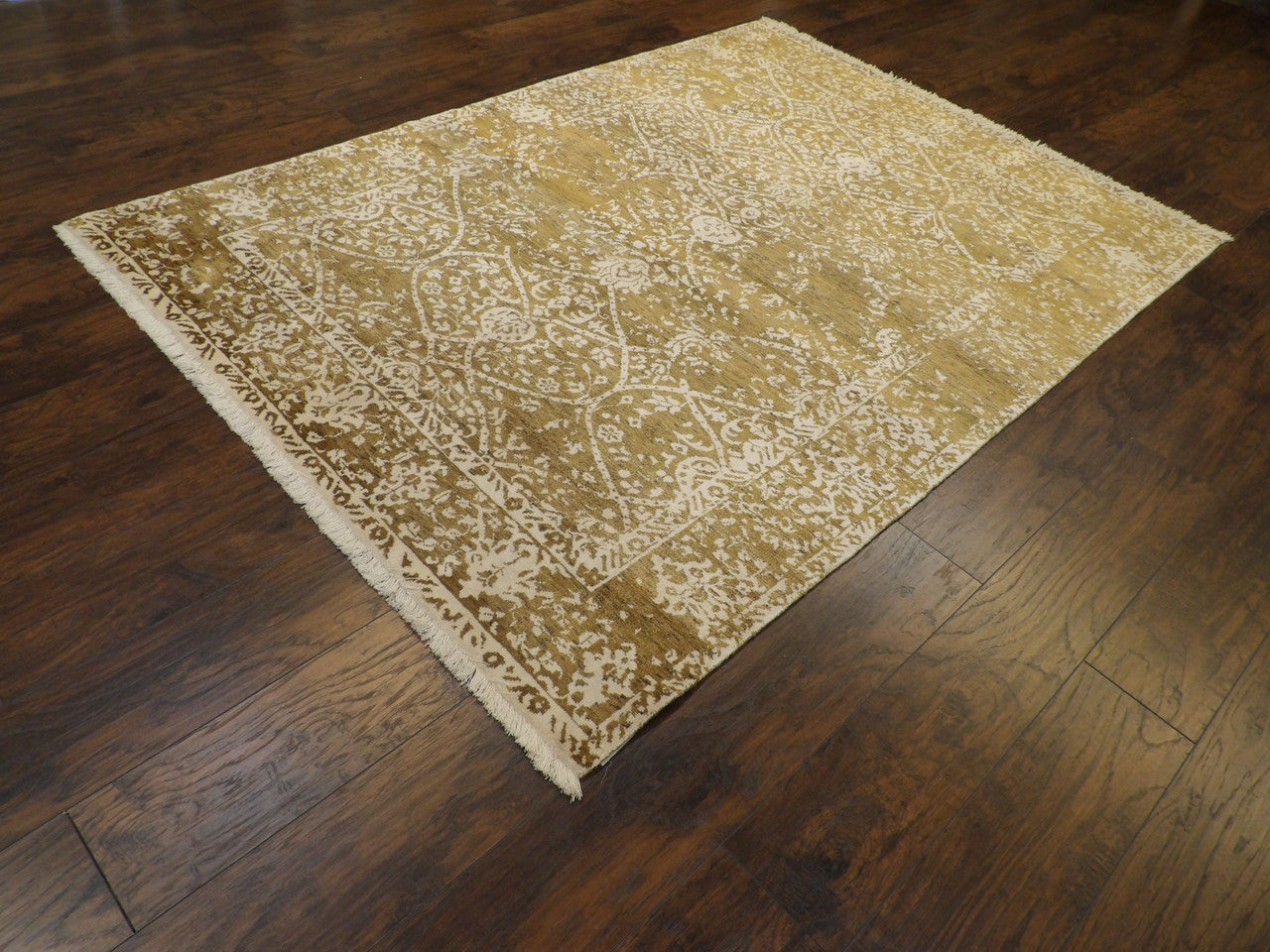 Broken damask pattern detail, beige and ivory rug