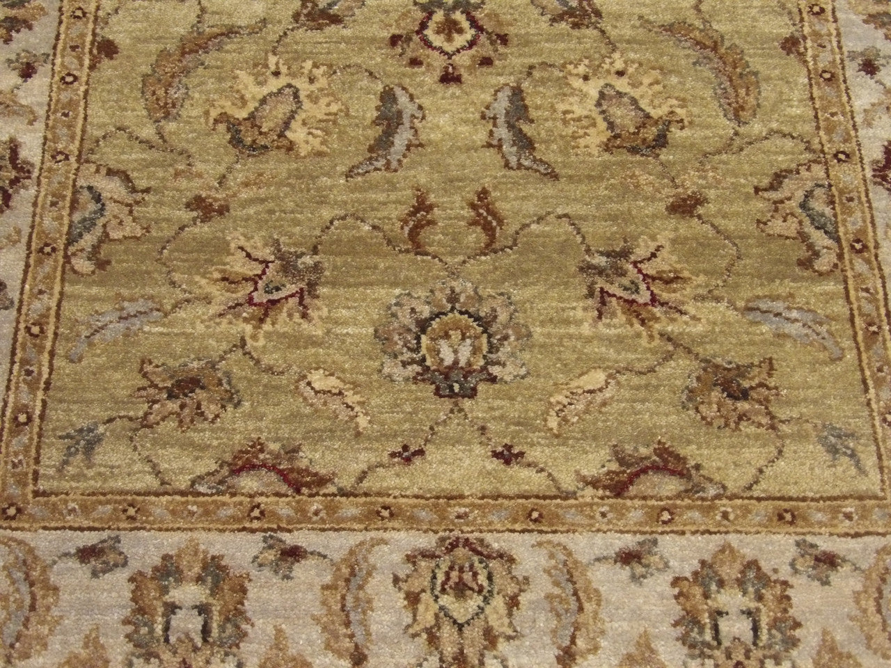 Indo Chobie rug border detail, green and gray