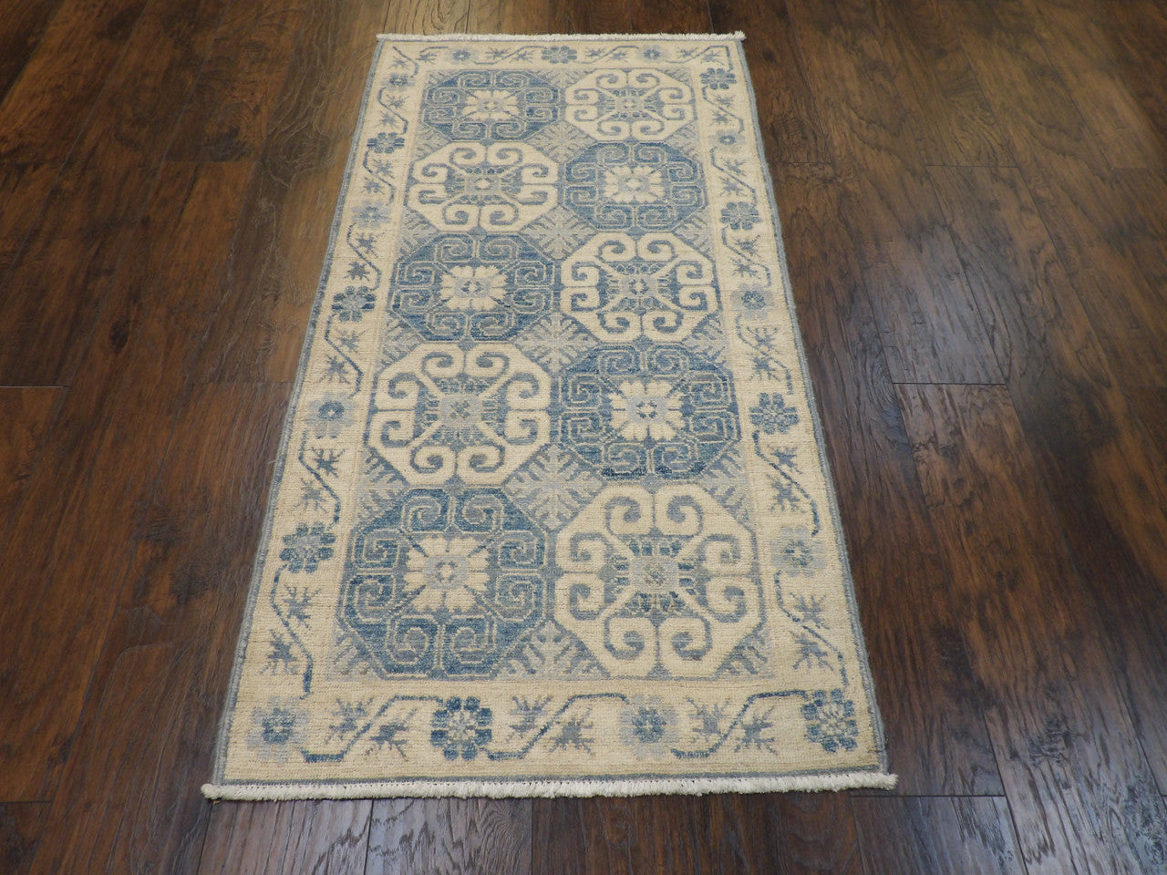 Tribal Khotan rug corner detail