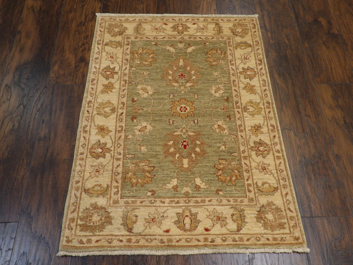 Close-up of wool pile, Green & Beige rug