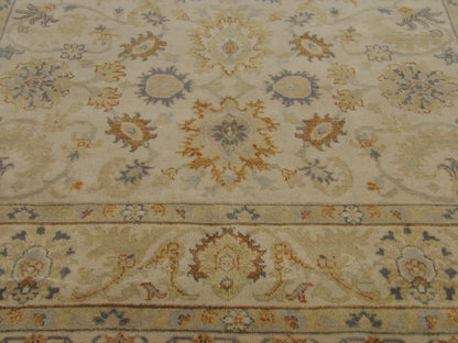 Oushak rug border detail, beige and blue
