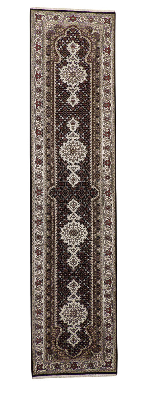 Traditional Qum Design hand-knotted wool rug in Black, full view