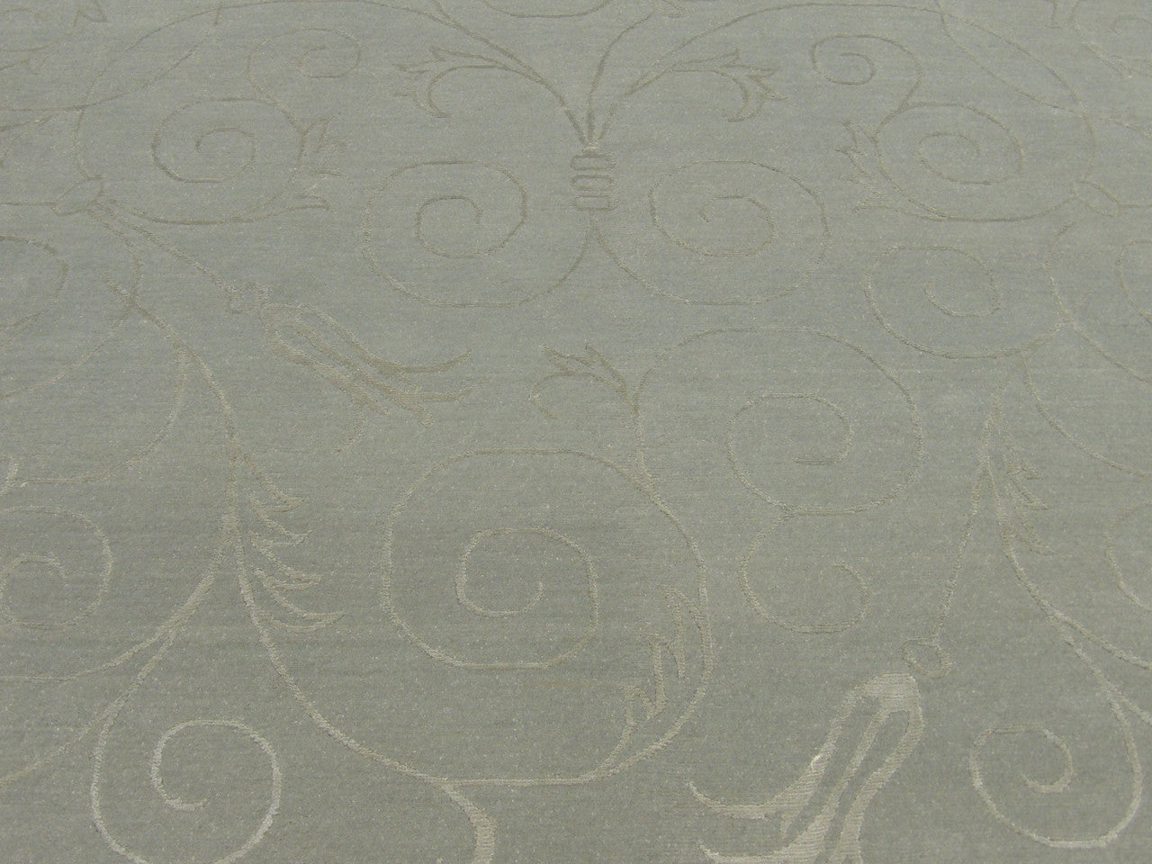Transitional floral rug border detail, blue