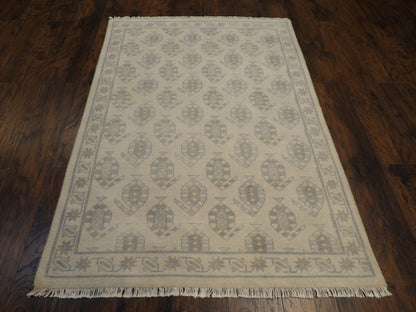 Close-up of wool pile, blue and beige rug