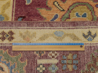 Purple Oushak rug in room setting