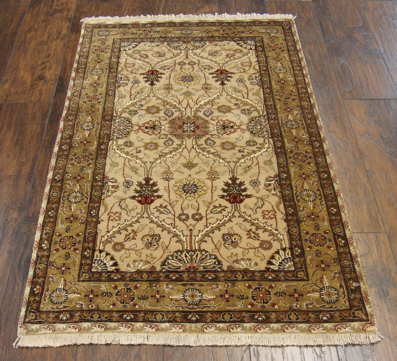 Beige and green Kashan rug in a home office setting