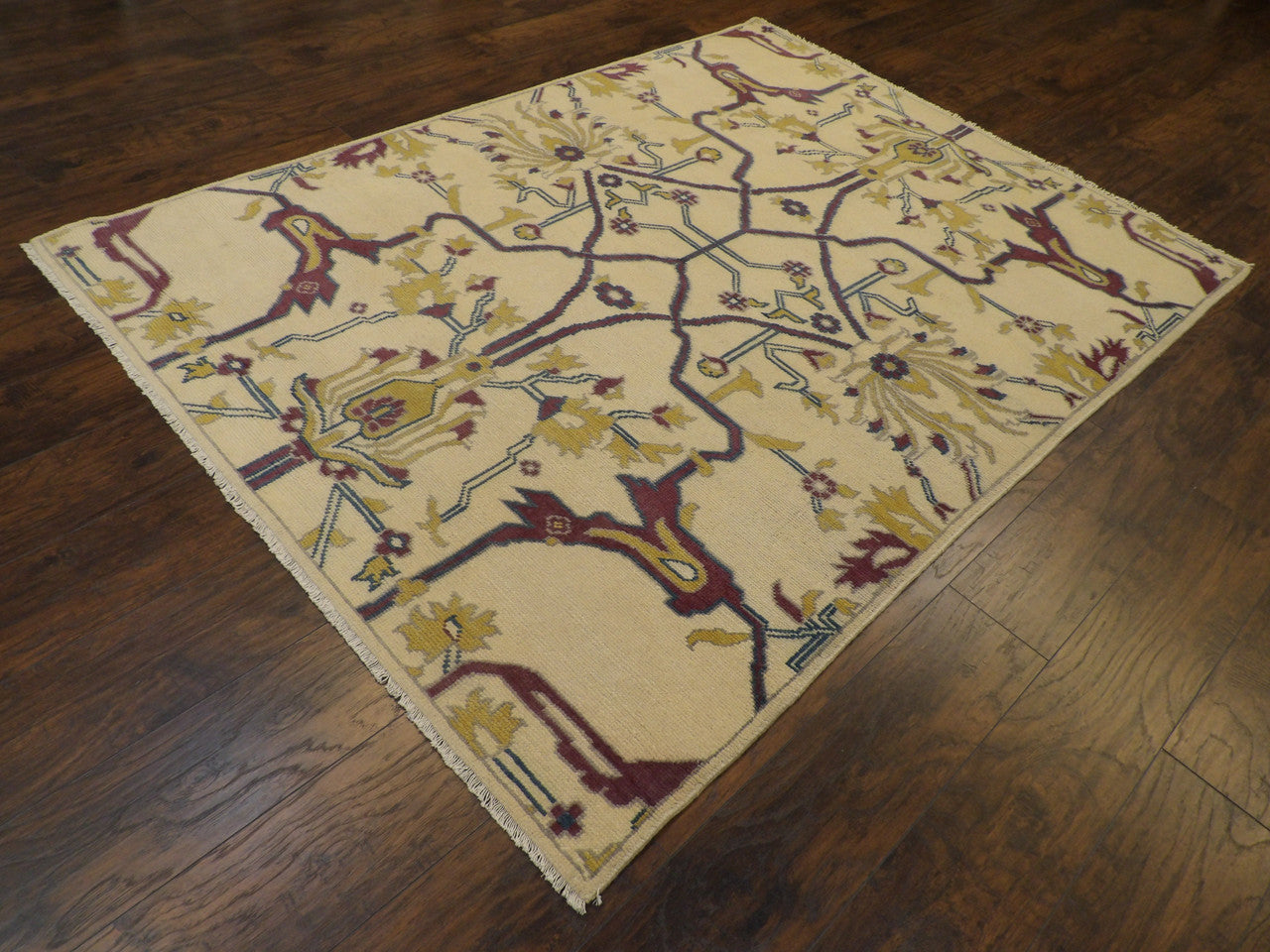 Ziegler pattern detail, beige and red natural dye rug