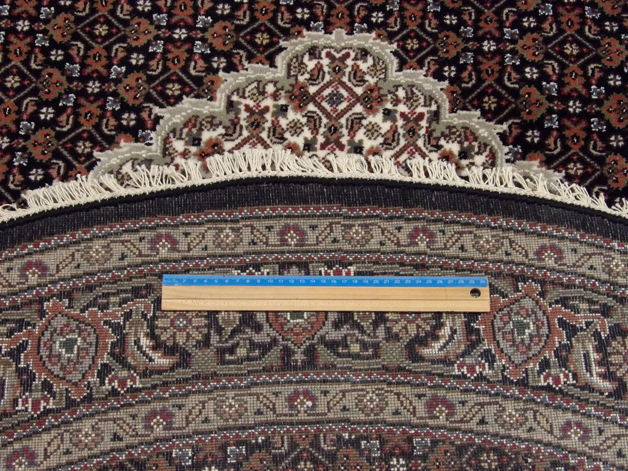 Black Fine Persian Mahi Tabriz rug in room setting