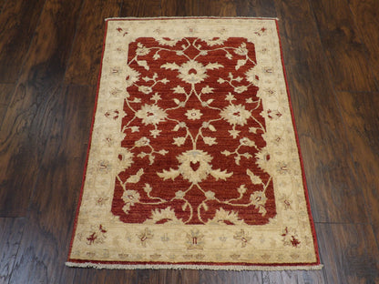 Close-up of wool pile, beige and red rug