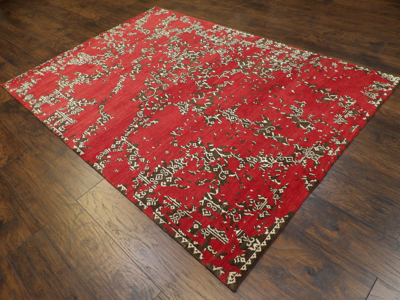 Broken pattern detail, brown rug