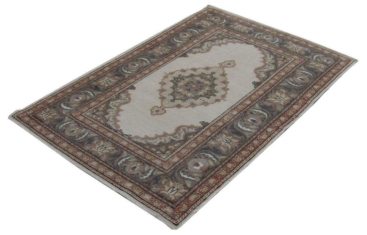 Close-up of aged wool pile on antique Oushak rug