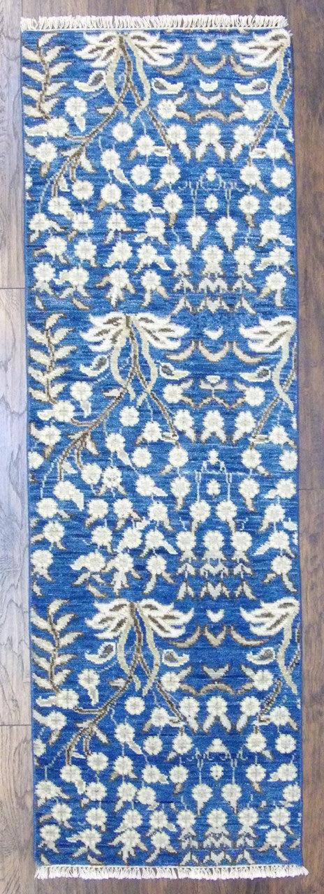 Transitional flower design hand-knotted wool runner in blue and beige, full view