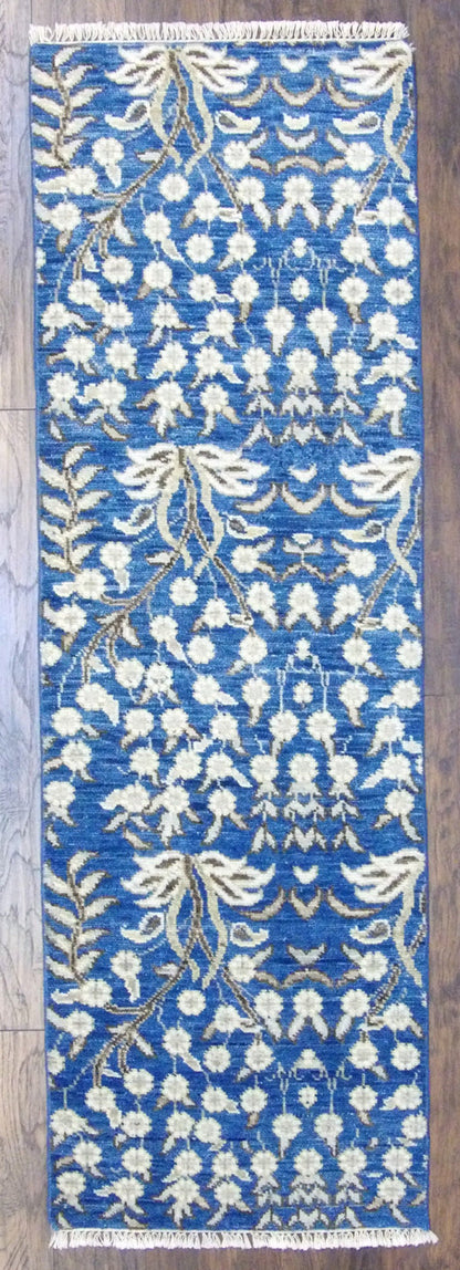 Transitional flower design hand-knotted wool runner in blue and beige, full view