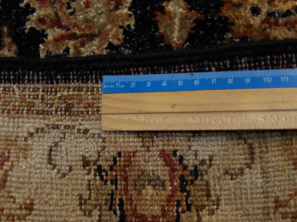 Black and beige Kashan Ziegler rug in room setting