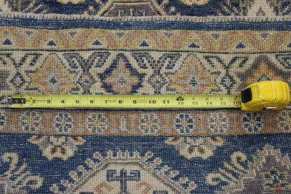 Blue Tribal Super Kazak rug in room setting
