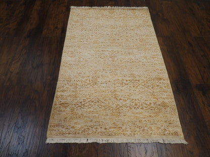 Close-up of wool pile, gold modern rug
