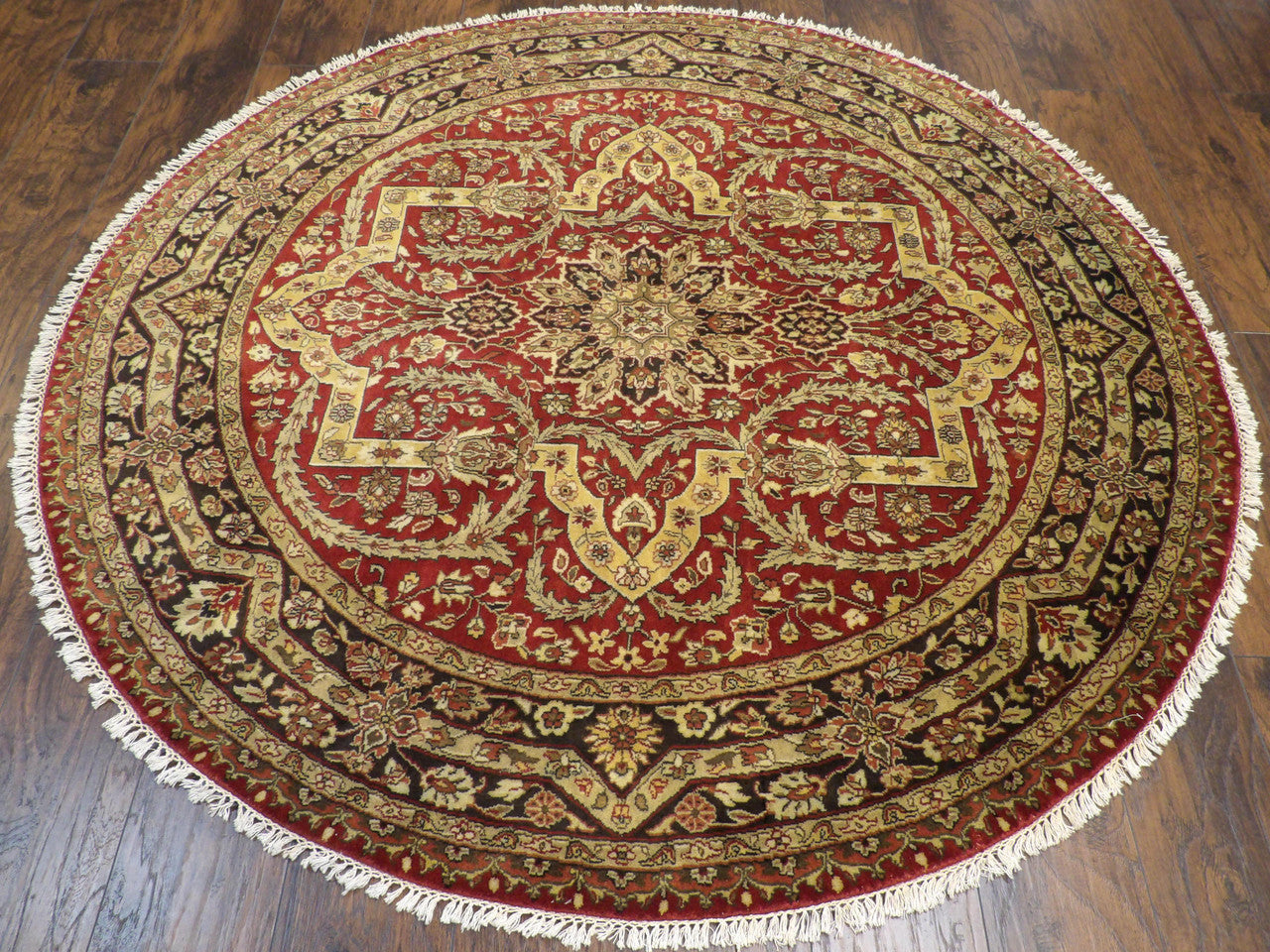 Close-up of fine knotting on Persian Tabriz round rug