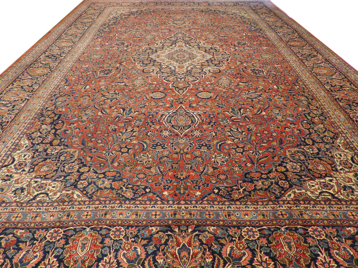 Close-up of wool pile, antique blue and red rug
