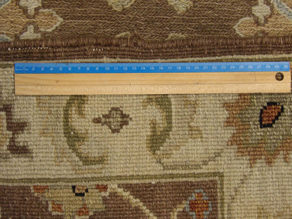 Brown & Gold Tribal Soumak rug in room setting