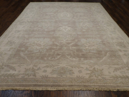 Close-up of wool pile, brown and ivory rug