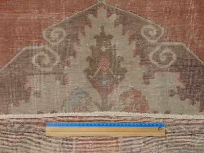 Pink & Purple Vintage Antique Anatolian rug in room setting