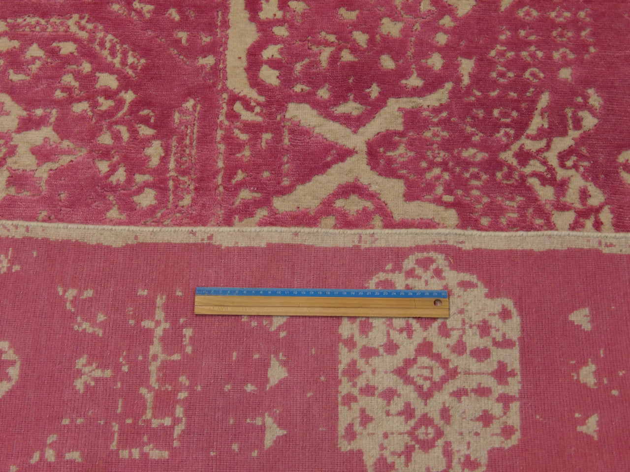 Beige and pink Mamluk rug in room setting