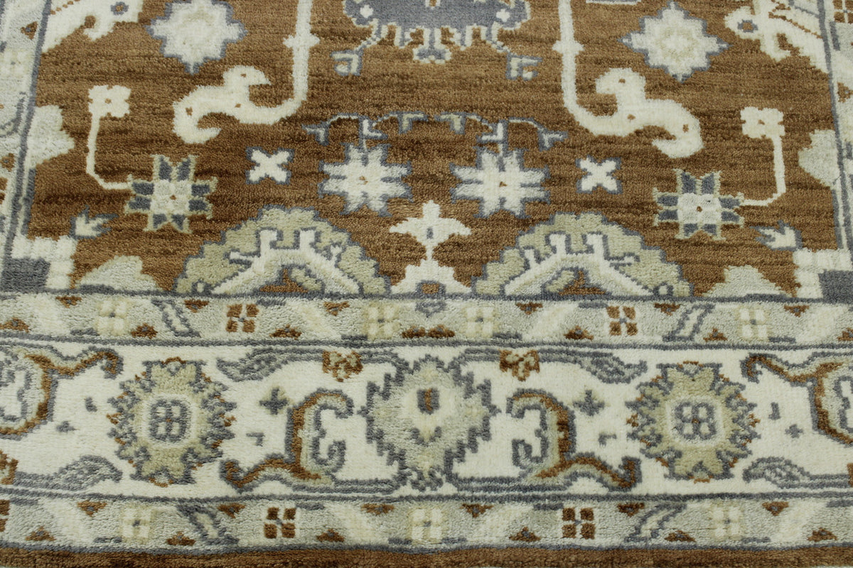 Brown & Beige Oushak Ziegler rug in room setting