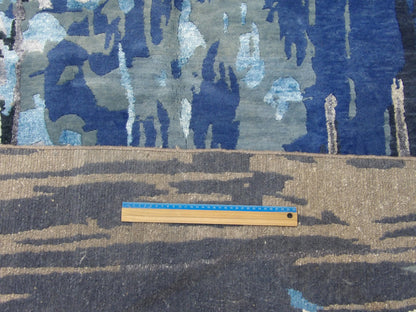 Full room view of oversized Modern Monsoon hand-knotted rug